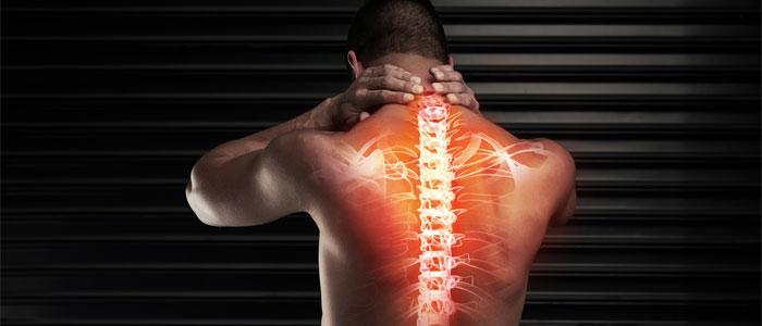 Man holding neck in pain